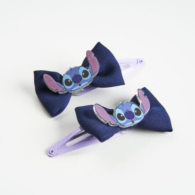 [000009477] ACCESORIOS PELO CLIPS LAZO STITCH